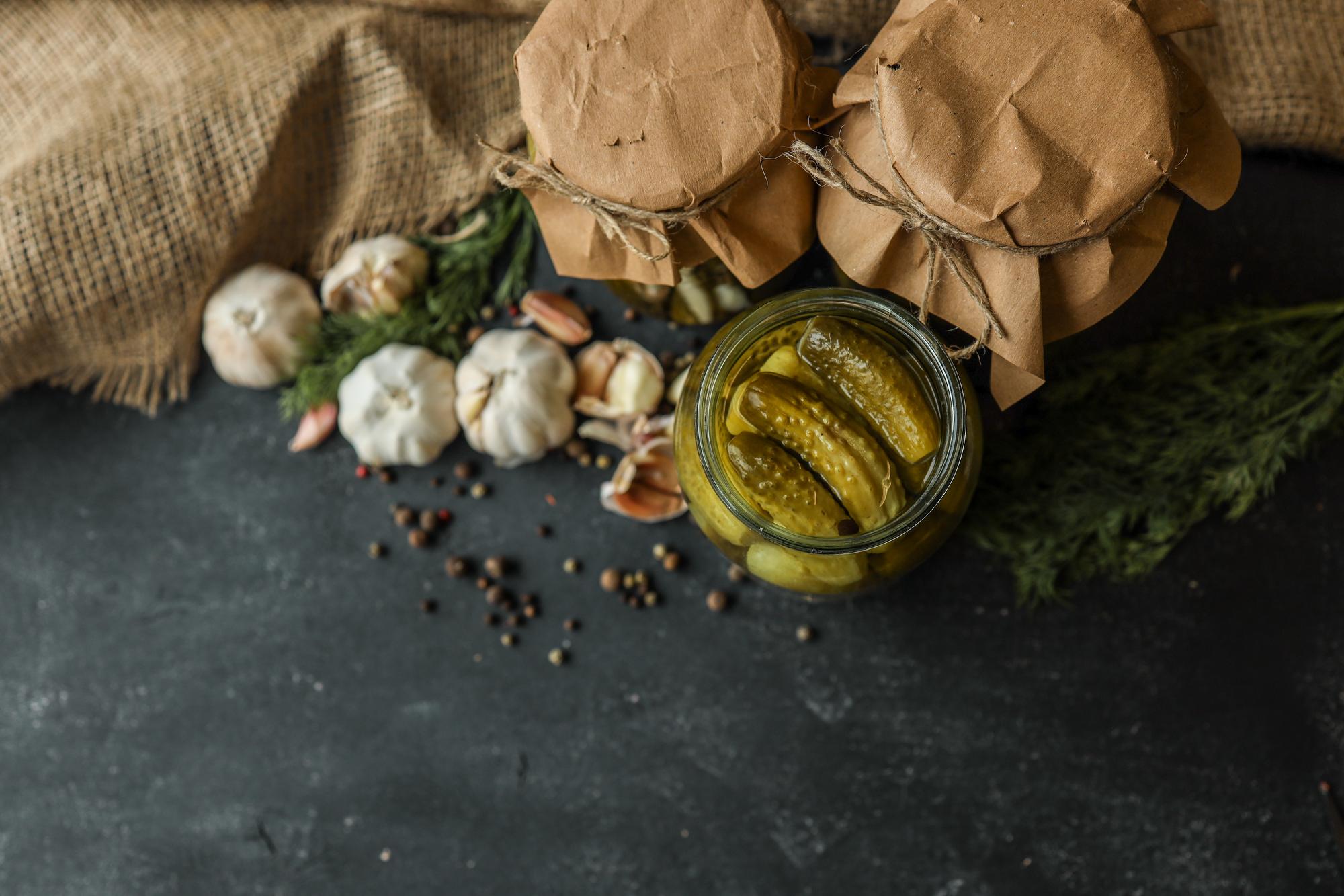 Ingredient spread: grains, greens, jars of pickles